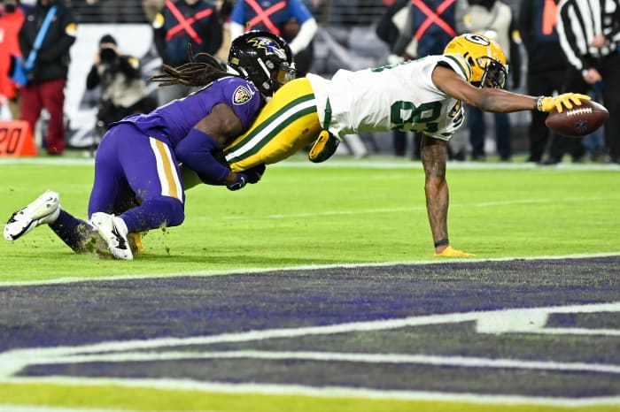 Dec 19, 2021; Baltimore, Maryland, USA; Green Bay Packers wide receiver Marquez Valdes-Scantling (83)] divers for a touchdown during the second half \HG\ at M&T Bank Stadium. Mandatory Credit: Tommy Gilligan-USA TODAY Sports